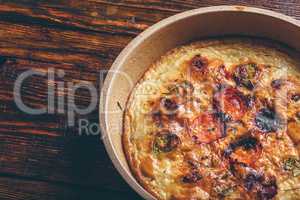 Frittata with chorizo, tomatoes and chili peppers.