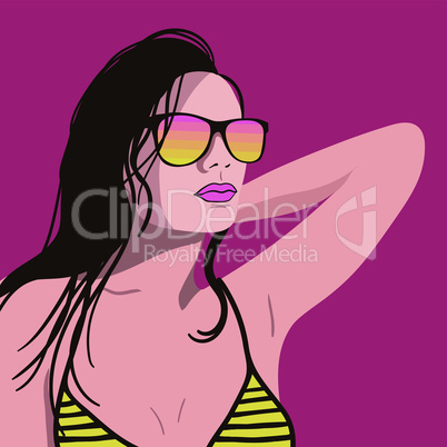 Young beautiful woman sunning in a bathing suit and sunglasses