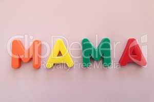 The first words that children spread out from toy plastic letters