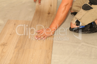 Work on laying flooring