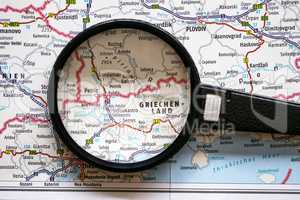 Greece on the map and magnifying glass