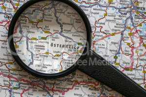 Austria on the map and magnifying glass