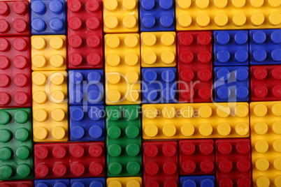 High quality seamless background of colored plastic bricks