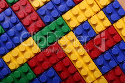 High quality seamless background of colored plastic bricks