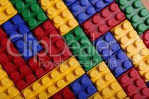 High quality seamless background of colored plastic bricks