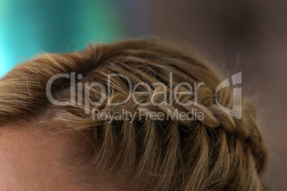 Portrait Of Beautiful Young Blond Woman With Braid Crown Hairstyle.