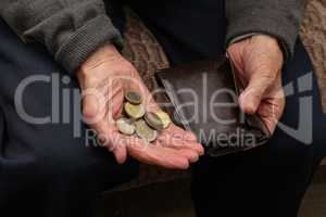 Pension / Money in the hands of an old man