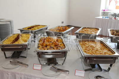 closeup of chafing dishes at a party