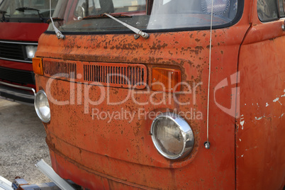 Old rusting buses at a city car dump