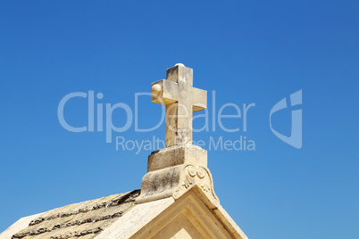 Stone cross at a chapel in Croatia