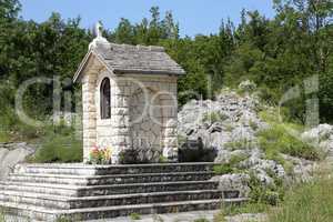 Small chapels built from white stone in Croatia