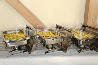 closeup of chafing dishes at a party