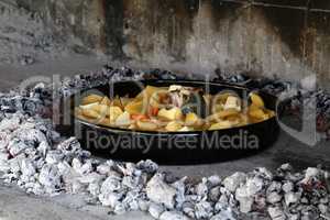 Grilling dishes with stews, potatoes and vegetables