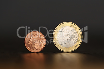 One Euro and One Cent Stand on the Edge