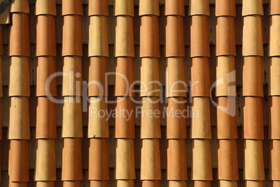 Red tile roof. Roof tiles on the roof