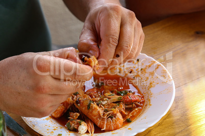 The Traditional Mediterranean Cuisine - Eating Shrimp Meals.