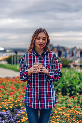 Beautiful young woman holding coffee cup