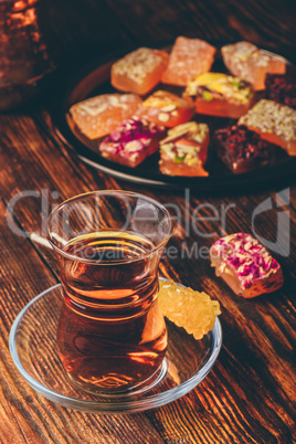 Tea in armudu glass with rahat lokum