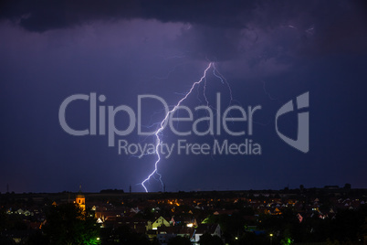 lightning at a thunderstorm in the evening