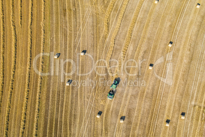 aerial of a grain field with tractor