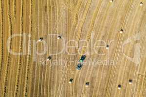 aerial of a grain field with tractor