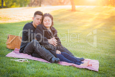 Hispanic Pregnant Young Couple Portrait Outdoors