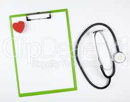 empty white sheets and medical stethoscope