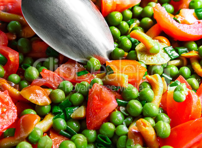 Tomatoes with mushrooms and green peas