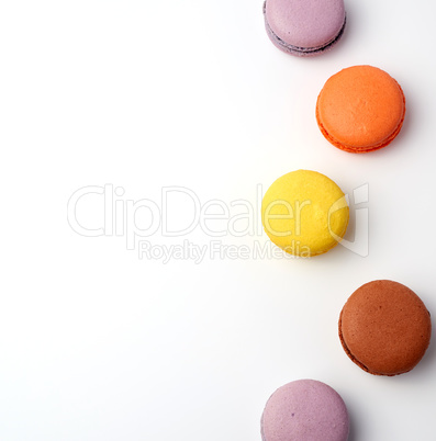 stack of colorful baked macaron almond flour on a white backgrou