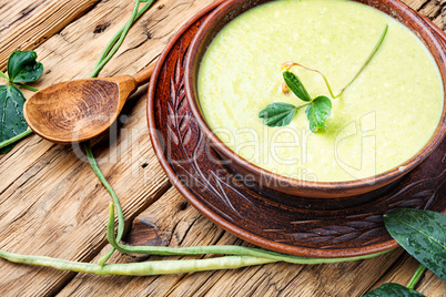 Fresh asparagus soup in bowl