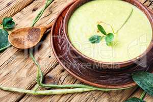 Fresh asparagus soup in bowl