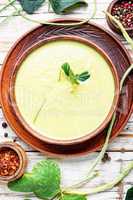 Fresh asparagus soup in bowl
