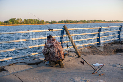 Fishermen on the waterfront in Kherson, Ukraine