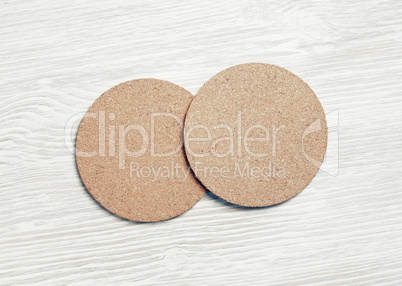 Two beer coasters