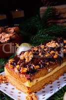 Chocolate gingerbread with filling, jam and nuts