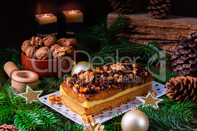 Chocolate gingerbread with filling, jam and nuts