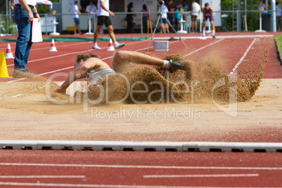 landing in the sand at the long jump