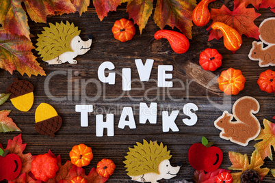 Colorful Autumn Decoration, Text Give Thanks, Wooden Background