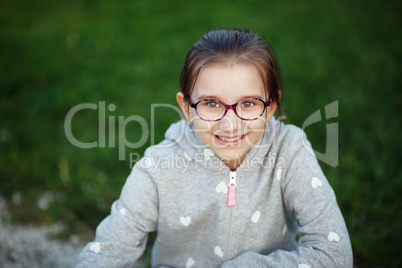 Smiling child with glasses