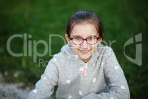 Smiling child with glasses