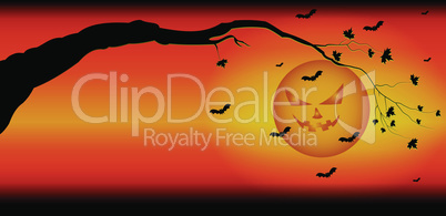 Silhouette of tree branches against the backdrop of ominous sky Halloween
