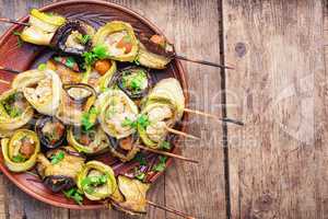 Eggplant with meat on skewers