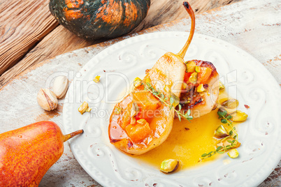 Ripe baked pear with pumpkin