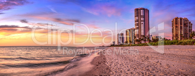 Sunset over North Gulf Shore Beach along the coastline of Naples