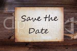 Old Paper, Text Save The Date, Wooden Background