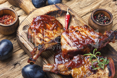 Grilled meat in plum sauce
