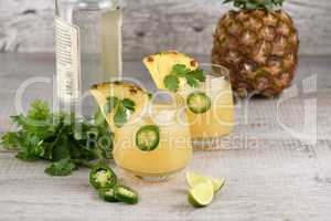 Tequila with pineapple and jalapeno