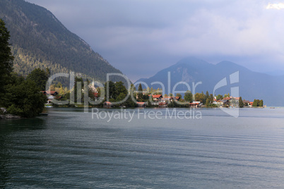 Cloudy day at lake Walchensee with Herzogstand mountain Jochberg, Germany