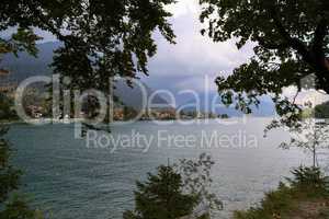 Cloudy day at lake Walchensee with Herzogstand mountain Jochberg, Germany