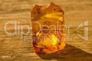 Amber in sun with inclusions